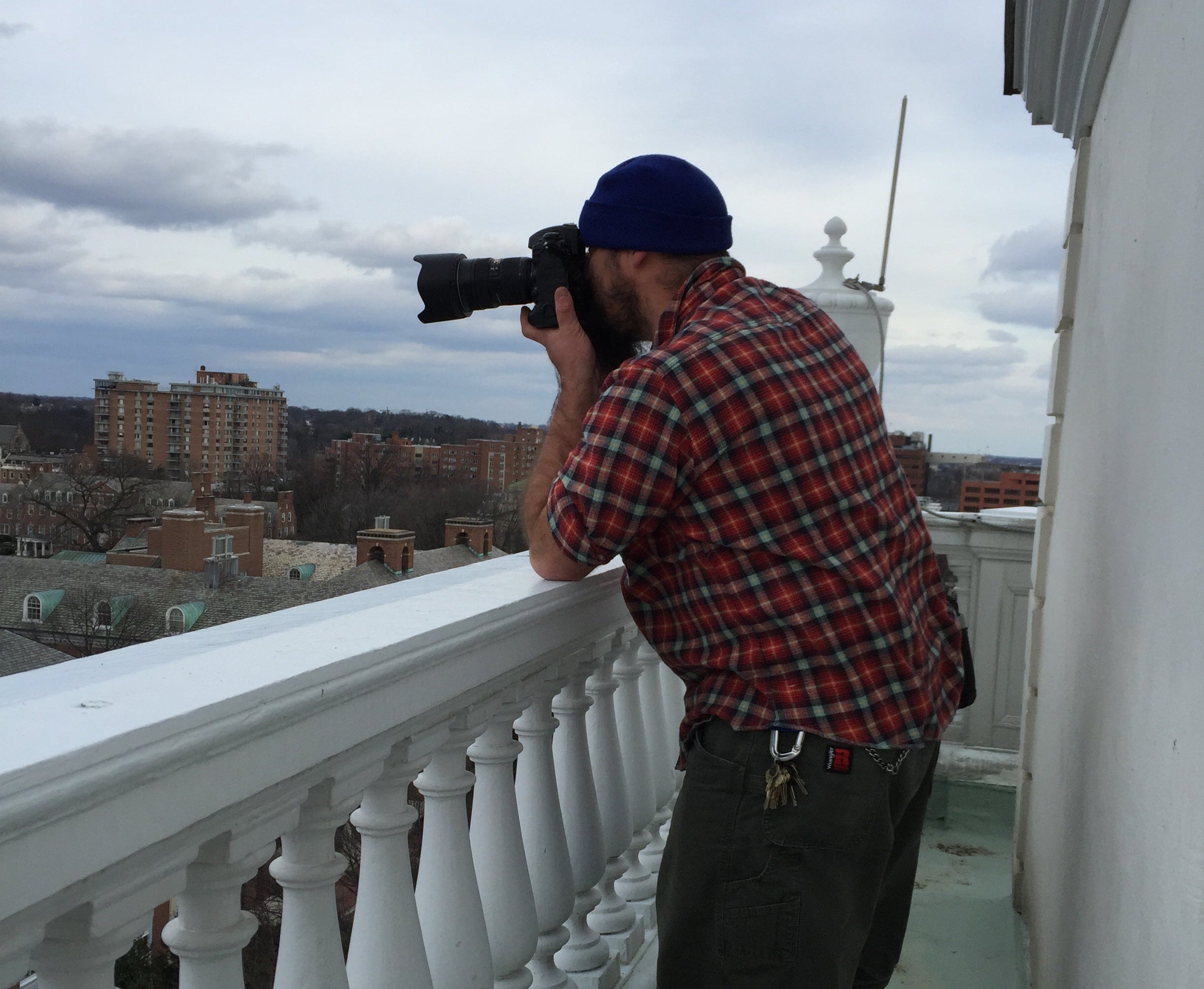Will Kirk Photographer on the Gilman Hall Clock Tower shooting towards the MSE library on the Johns Hopkins Campus